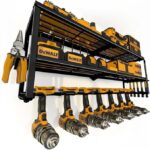 About this item 𝐎𝐫𝐠𝐚𝐧𝐢𝐳𝐞 𝐘𝐨𝐮𝐫 𝐓𝐨𝐨𝐥𝐬 𝐄𝐟𝐟𝐢𝐜𝐢𝐞𝐧𝐭𝐥𝐲: Keep your garage tidy with our power tool organizer wall mount, designed to hold up to 7 drills and other tools. This power tool organizer’s three-layer shelf system provides a dedicated spot for each item, making your tools easy to find and use, which helps you work more efficiently. 𝐁𝐮𝐢𝐥𝐭 𝐭𝐨 𝐋𝐚𝐬𝐭: Made from durable alloy steel with a protective powder-coated finish, these storage shelves are strong and reliable. These tool organizers and storage can support up to 180 pounds, making them perfect for holding your heavy power tools. The sturdy construction ensures they will stand up to daily use in any garage or workshop. 𝐒𝐩𝐚𝐜𝐞-𝐒𝐚𝐯𝐢𝐧𝐠 𝐃𝐞𝐬𝐢𝐠𝐧: Our garage wall organizer is compact (7.87"D x 26"W x 13.06"H) and mounts easily to your garage wall, helping you save valuable floor space. By keeping your tools neatly stored and accessible, you can make the most of your workspace and keep everything within arm's reach. 𝐄𝐚𝐬𝐲 𝐭𝐨 𝐈𝐧𝐬𝐭𝐚𝐥𝐥: This garage tool organizer wall mount is designed for simple, straightforward installation on any wall. The tool storage organizer comes with all the necessary hardware, so you can set it up quickly and start organizing your tools right away. Its lightweight design (just 9.38 pounds) makes handling and mounting a breeze. 𝐕𝐞𝐫𝐬𝐚𝐭𝐢𝐥𝐞 𝐚𝐧𝐝 𝐏𝐫𝐚𝐜𝐭𝐢𝐜𝐚l: Our garage tool organizer is a complete storage solution for your garage.